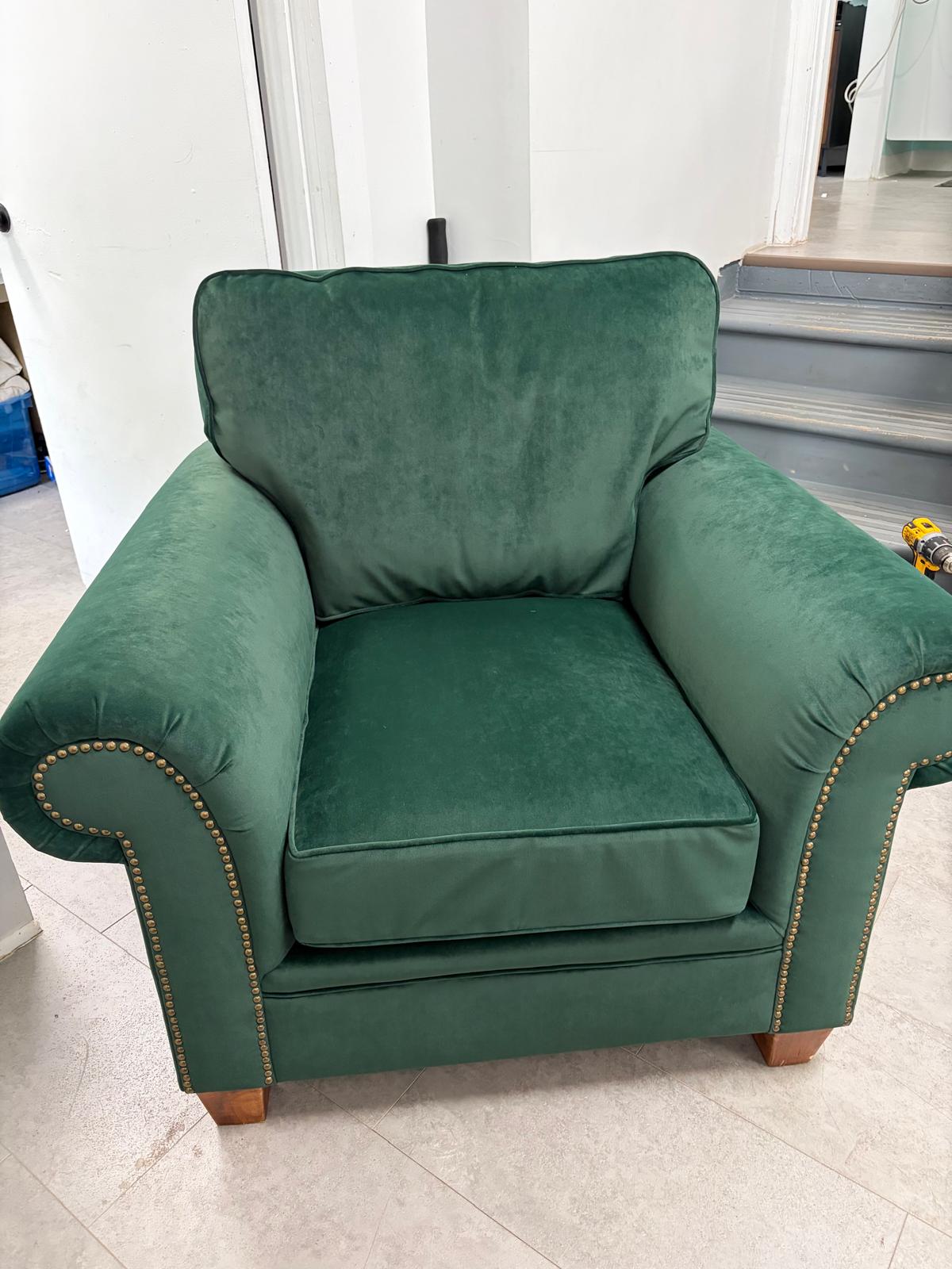 Green velvet armchair