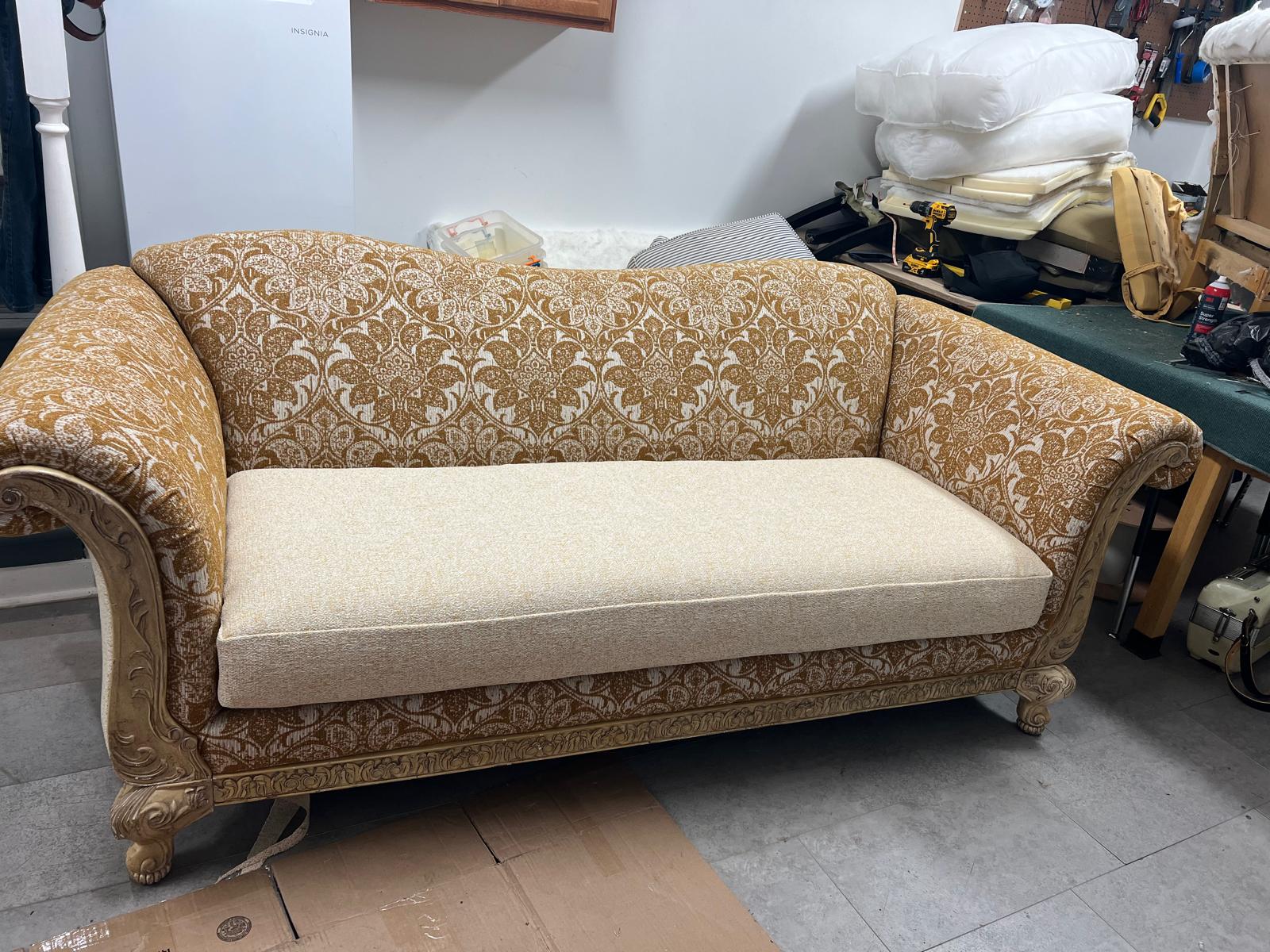 Ornate carved sofa